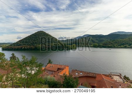 Beautiful View Of Lake Piediluco. In The Foreground Are The Shingles Roofs Of The Town Of Piediluco 