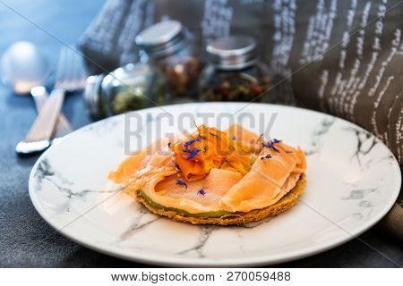 Asparagus salmon tartlets chiffonade, pickled vegetables, creamy creamy