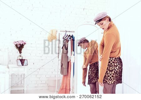 Appealing Travesty Man Staying Against Full Length Mirror