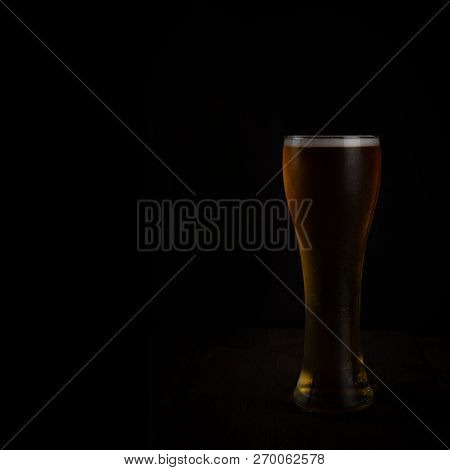 Glass Of Beer On Dark Background