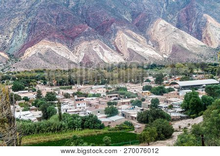 Village Maimara Under Colorful Rock Called Paleta Del Pintor Painters Palette In Quebrada De Humahua