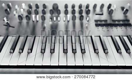 metallic analog synthesizer, close-up view