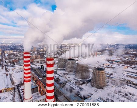 Aerial Top View Clouds Of Smoke And Steam Cooling Tower Industrial Heat Electro Central Coal. Enviro
