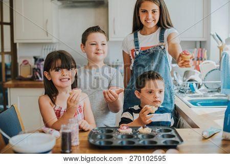 Family with fresh homemade cucakes
