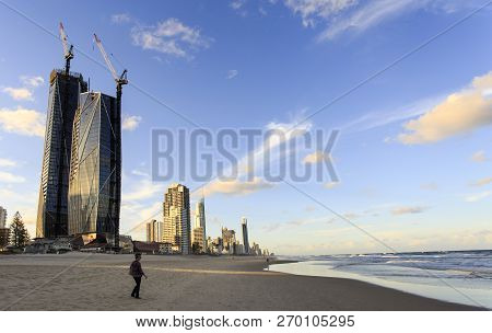 Gold Coast, Australia - November 13, 2018:  Walk On Broadbeach At Sunset Having The Skyscrapers In T