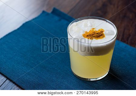 Spicy Pisco Sour Cocktail Made With Lime Juice, Egg White And Peruvian Grape Schnaps.
