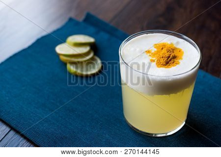 Spicy Pisco Sour Cocktail Made With Lime Juice, Egg White And Peruvian Grape Schnaps.