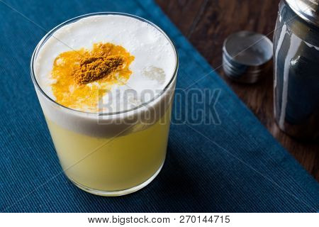 Spicy Pisco Sour Cocktail Made With Lime Juice, Egg White And Peruvian Grape Schnaps.