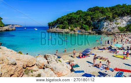 Mallorca, Spain - May 20, 2018: People On Cala Llombards Beach Enjoying Summer Holiday On Palma De M