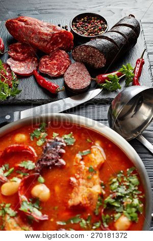 Close-up Of Fabada Asturiana Bean Hearty Stew In A Pot. Main Ingredients - Sliced Chorizo, Blood Sau