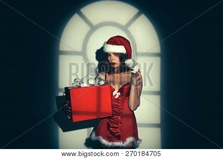 Christmas Gifts For Sexy Woman. New Year Santa Girl. Sexy Girl In Red Lingerie. New Year Party. Home