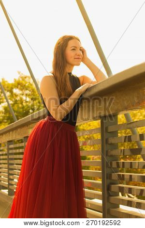 Young Slim Woman With Long Brown Hair Dancing