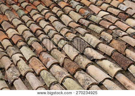 Old Red Tiles Roof. Closeup Top View Background. Stock Image.