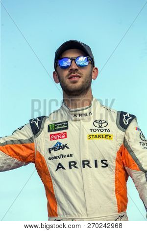 November 18, 2018 - Homestead, Florida, USA: Daniel Suarez (19) takes to the stage for driver introductions at the Ford 400 at Homestead-Miami Speedway in Homestead, Florida.