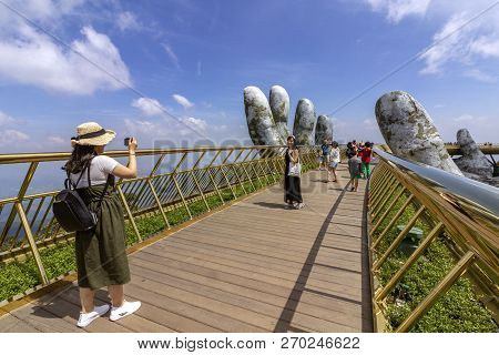Da Nang, Vietnam - October 31, 2018: Tourists In Golden Bridge Known As 