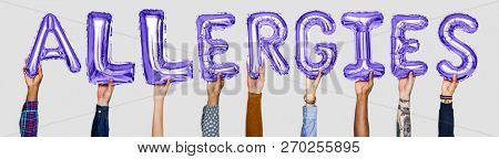 Hands holding allergies word in balloon letters