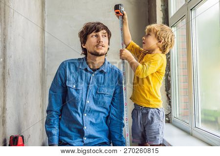 Father And Son Repair Windows Together. Repair The House Yourself