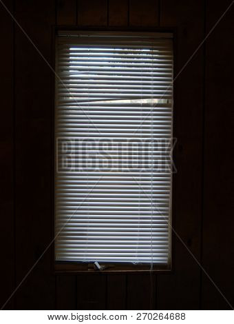 White Window Blinds Treatment And Wood Panel Board Walls