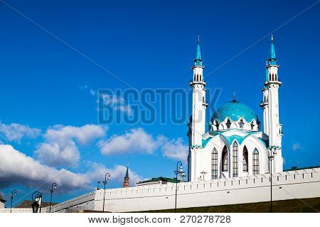Minarets Of The Mosque Against The Blue Sky