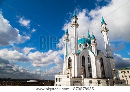Minarets Of The Mosque Against The Blue Sky