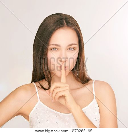 Young Beauty Girl. Shh Concept. Silent Gesture