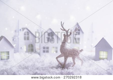 Magical Christmas Paper Village . Winter Background Landscape With Houses, Trees, Deer On Frosty Blu