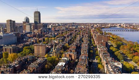 Row Houses And Buildings All In A Row Beside The River Looking South From Boston Downtown