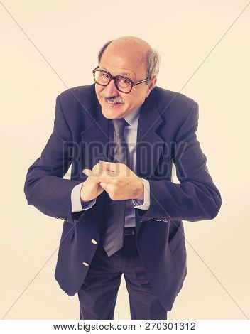Portrait Of Last Day At Work Of Happy Senior Businessman Excited About His Retirement