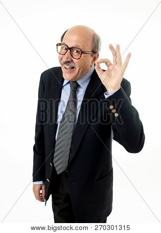 Portrait Of Last Day At Work Of Happy Senior Businessman Excited About His Retirement