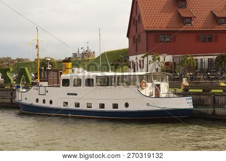 Klaipeda, Lithuania - September 22, 2018: Old Small Ship Near Embankment In The Center Of Klaipeda (