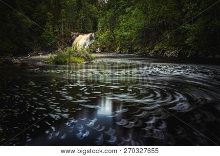 Long Exposure Shot Of Flowing River Homla And Waterfalls.