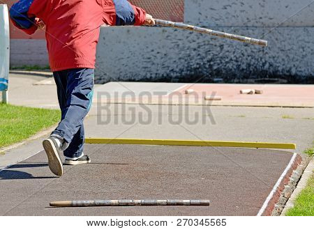 Gorodki - A Russian Folk Sports Game. In This Game You Need Specific Distances To Smash Figures Made