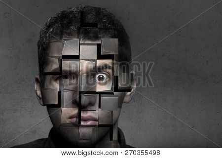 Portrait Of A Man With A Puzzled Look That Breaks Down Into Cubes, The Concept Of Trouble And Self-d