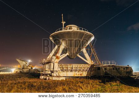 Radio Telescope Satellite Antenna At Starry Night.