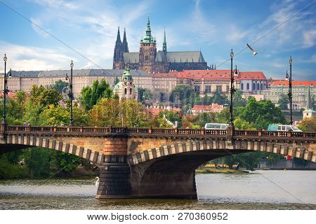 Majestic St Vitus Cathedral And Manesuv Bridge In Prague