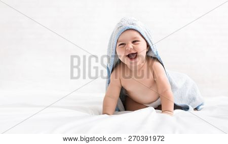 Happy Baby Crawling On Bed After Bath, Babycare, Copy Space