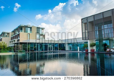 Ajman, United Arab Emirates - 30 October 2018: Landscape With Modern Design Buildings, Lagoon Pool A