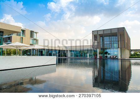 Ajman, United Arab Emirates - 30 October 2018: Landscape With Modern Design Buildings, Lagoon Pool A