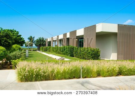 Ajman, United Arab Emirates - 30 October 2018: Landscape With Modern Design Villas And Garden In A L