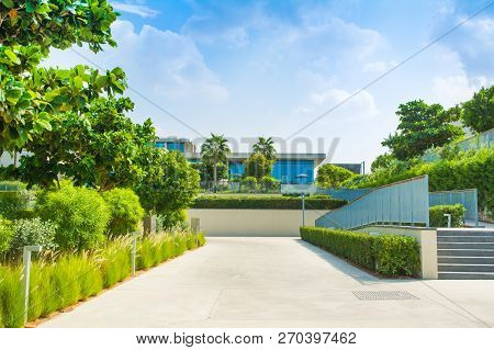 Ajman, United Arab Emirates - 30 October 2018: Landscape With Modern Design Villas And Garden In A L