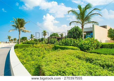 Ajman, United Arab Emirates - 30 October 2018: Landscape With Modern Design Villas And Garden In A L
