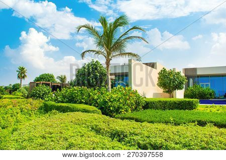 Ajman, United Arab Emirates - 30 October 2018: Landscape With Modern Design Villas And Garden In A L