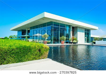 Ajman, United Arab Emirates - 30 October 2018: Landscape With Modern Design Buildings, Lagoon Pool A