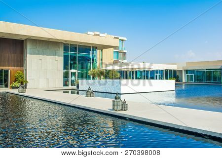 Ajman, United Arab Emirates - 30 October 2018: Landscape With Modern Design Buildings, Lagoon Pool A