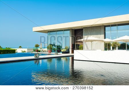 Ajman, United Arab Emirates - 30 October 2018: Landscape With Modern Design Buildings, Lagoon Pool A