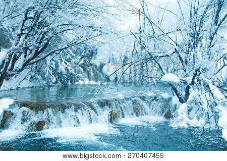 Croatia, Plitivice, Frozen Waterfalls In Popular Nature Park Plitvicka Jezera