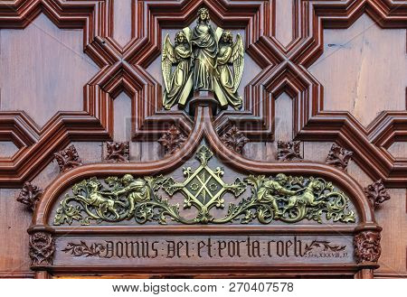 Ornate Inscription Domus Dei Et Porta Coeli Meaning House Of God, And Door To Heaven On The Wooden E