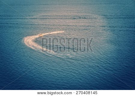 Sunset Time Over Blue Orange Black Sea Background