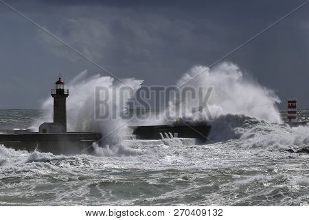 Big Storm With Big Waves Near A Lighthouse