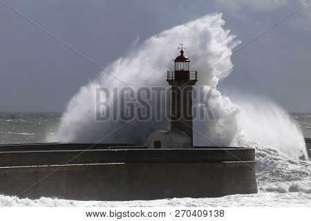 Big Storm With Big Waves Near A Lighthouse